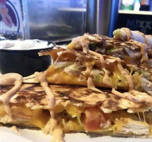 Homemade chili quesadilla at Rooster's Wings & Brew.