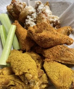 Assorted sauced chicken wings at Rooster's Wings & Brew.