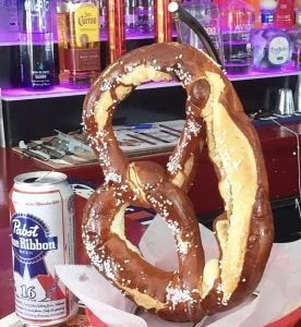 Large salted soft pretzel at the Rooster's Wings & Brew bar.