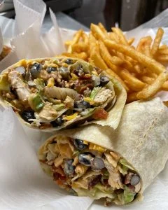 Rooster's Southwest chicken wrap with black beans and fries