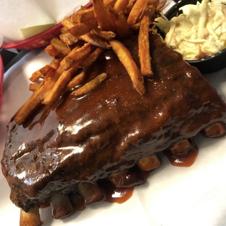 BBQ ribs & sweet potato fries at Rooster’s Wings & Brew