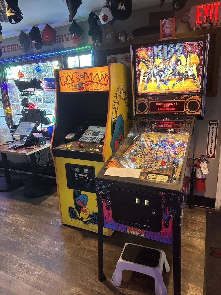 KISS pinball machine inside Roosters