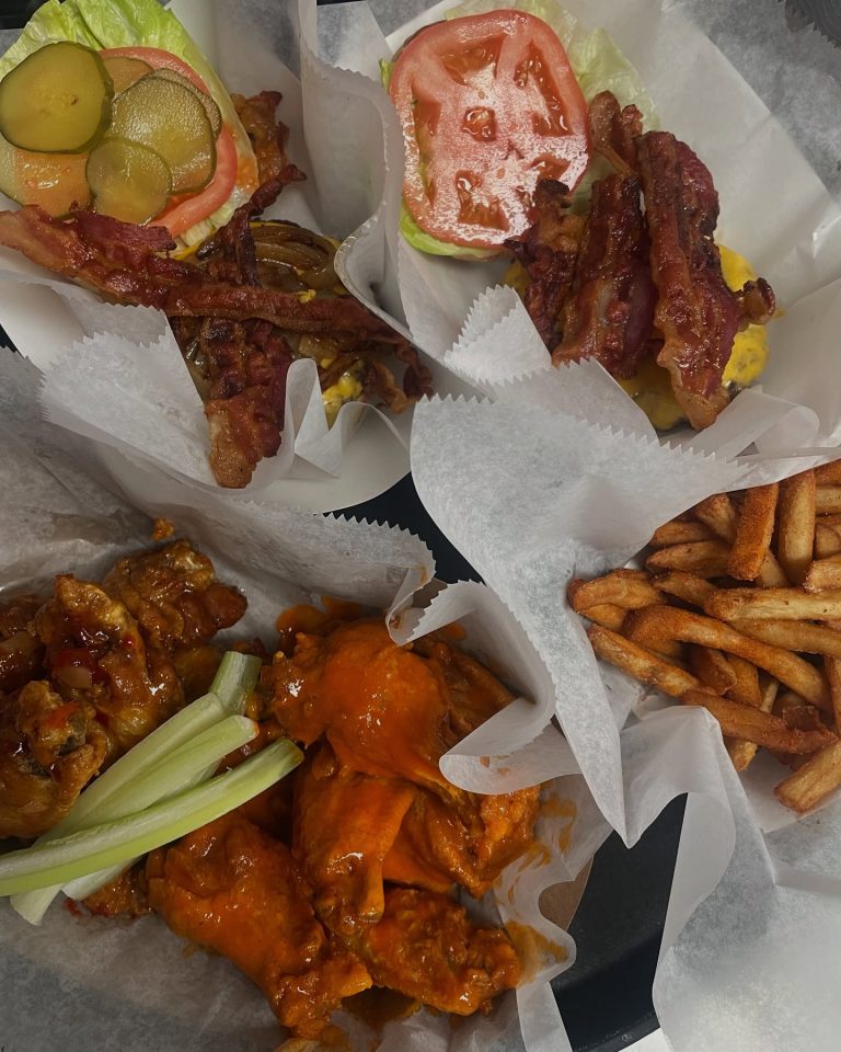 Burgers, wings and fries served at Rooster's Wings and Brew