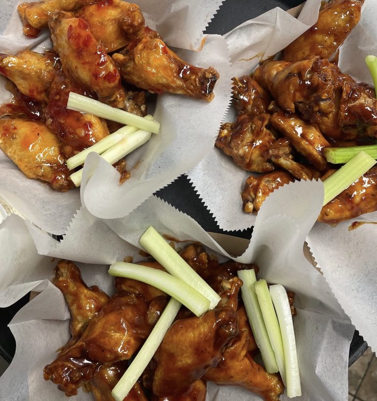 Fresh Roosters wings ready to serve