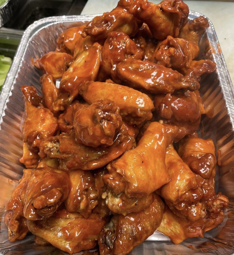 Roosters wings with a house sauce