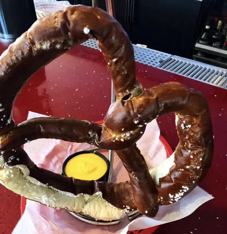Giant pretzel with mustard at Roosters Wings & Brew